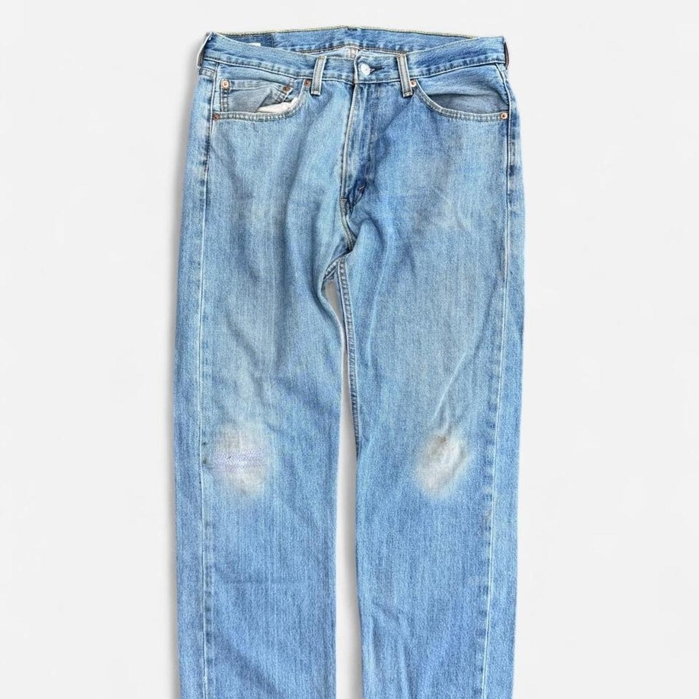 Levi's Distressed Light Wash Jeans Repaired Details